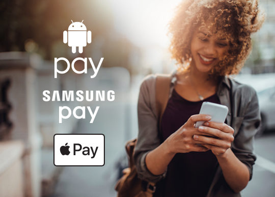 Woman using her mobile phone to make a mobile payment
