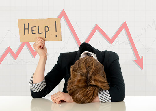 woman with head down holding up sign saying "help" in front of up-and-down red arrow