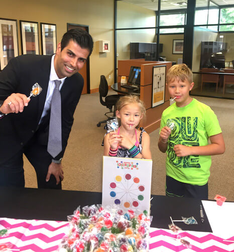 Kids with Beaverton Branch Manager Ashkan Jafari