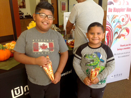 Two kids at a Unitus branch