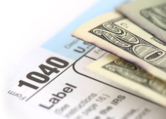 1040 tax document and cash