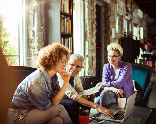 A group of female designers relaxing in their office